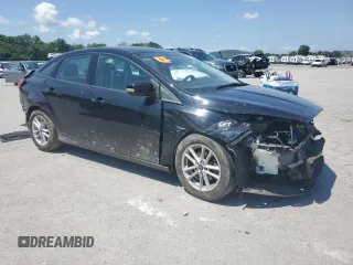 2017 Ford Focus SE with VIN 1FADP3F28HL283237, listed as a Copart auction lot 62021405 with 95,824 mi miles and Salvage title. Bid and sale history available at DreamBid. Image 4.