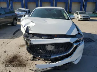 2020 Mazda CX-5 Touring with VIN JM3KFACM0L0770254, listed as a Copart auction lot 71066824 with 0 mi miles and Salvage Title. Bid and sale history available at carsss.com. Image 5.