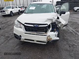 2017 Subaru Forester with VIN JF2SJABC7HH591087, listed as a IAAI auction lot 41858995 with Not Provided miles and . Bid and sale history available at DreamBid. Image 6.