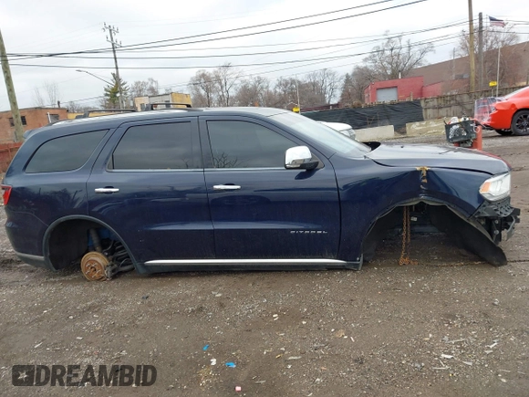 2014 Dodge Durango Citadel with VIN 1C4SDJET4EC543329, listed as a IAAI auction lot 41114870 with Not Provided miles and . Bid and sale history available at DreamBid. Image 12.