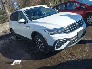 2022 Volkswagen Tiguan S with VIN 3VV0B7AX1NM035831, listed as a IAAI auction lot 41130297 with 64,298 mi miles. Bid and sale history available at carsss.com. Image 1.