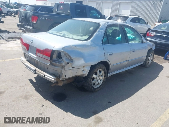 2002 Honda Accord EX z VIN JHMCG56612C026303, wystawiony jako IAAI lot #41992812 z przebiegiem 153 021 mil mil oraz . Historia ofert i sprzedaży dostępna na DreamBid. Obrazek 4.