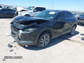 2022 Mazda CX-30 S Select z VIN 3MVDMBBL7NM413447, wystawiony jako IAAI lot #41772804 z przebiegiem 69 102 mil mil oraz . Historia ofert i sprzedaży dostępna na DreamBid. Obrazek 2.