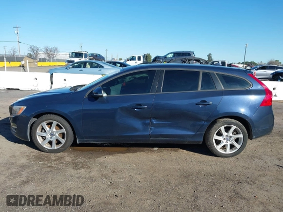 2015 Volvo V60 T5 Drive-E with VIN YV140MEJ8F1261268, listed as a IAAI auction lot 41517740 with 112,991 mi miles. Bid and sale history available at carsss.com. Image 14.