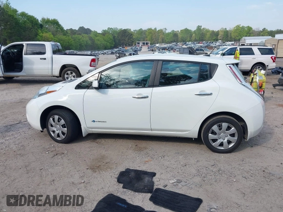 2015 Nissan LEAF SL z VIN 1N4AZ0CP2FC312062, wystawiony jako IAAI lot #42069975 z przebiegiem 250 000 mil mil oraz . Historia ofert i sprzedaży dostępna na DreamBid. Obrazek 14.