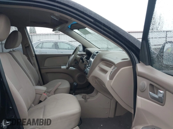 2009 Kia Sportage LX with VIN KNDJE723497612745, listed as a IAAI auction lot 41974301 with 141,110 mi miles and . Bid and sale history available at carsss.com. Image 5.