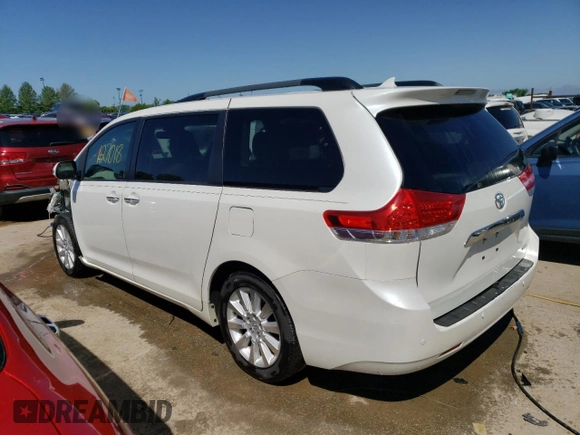 2014 Toyota Sienna XLE with VIN 5TDYK3DC6ES427920, listed as a Copart auction lot 54075594 with 127,018 mi miles and Salvage title. Bid and sale history available at DreamBid. Image 2.