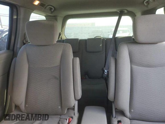 2015 Nissan Quest SV z VIN JN8AE2KP6F9130272, wystawiony jako Copart lot #42301055 z przebiegiem 282 779 mil mil oraz Tytuł czysty. Historia ofert i sprzedaży dostępna na DreamBid. Obrazek 10.