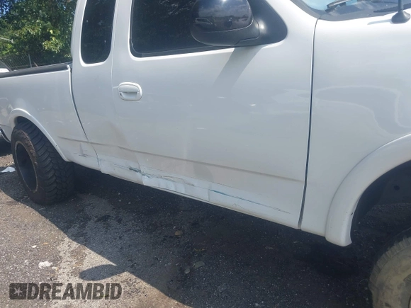 2001 Ford F-150 XL with VIN 1FTRX18L71NB11026, listed as a IAAI auction lot 42590063 with 218,156 mi miles and . Bid and sale history available at DreamBid. Image 6.