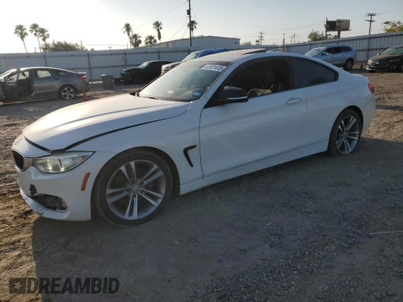 2015 BMW 4 Series 428i with VIN WBA3N3C59FK233053, listed as a Copart auction lot 52651415 with 165,218 mi miles and Salvage Title. Bid and sale history available at DreamBid. Image 1.