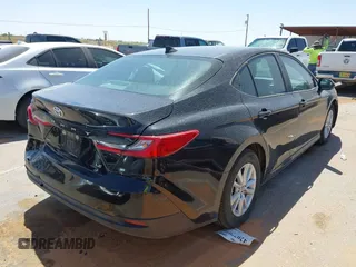2025 Toyota Camry LE with VIN 4T1DAACK9SU522182, listed as a IAAI auction lot 42048972 with 18,498 mi miles and . Bid and sale history available at DreamBid. Image 4.