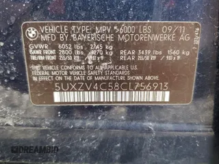 2012 BMW X5 35i z VIN 5UXZV4C58CL756913, wystawiony jako Copart lot #51746195 z przebiegiem 160 295 mil mil oraz Szkoda całkowita • Salvage title. Historia ofert i sprzedaży dostępna na DreamBid. Obrazek 13.
