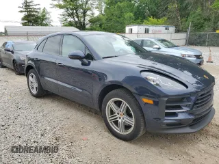 2019 Porsche Macan with VIN WP1AA2A56KLB02572, listed as a Copart auction lot 57733904 with 61,864 mi miles and Salvage title. Bid and sale history available at DreamBid. Image 4.