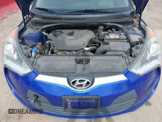 2014 Hyundai Veloster with VIN KMHTC6AD2EU184927, listed as a IAAI auction lot 42133499 with 103,499 mi miles. Bid and sale history available at carsss.com. Image 10.