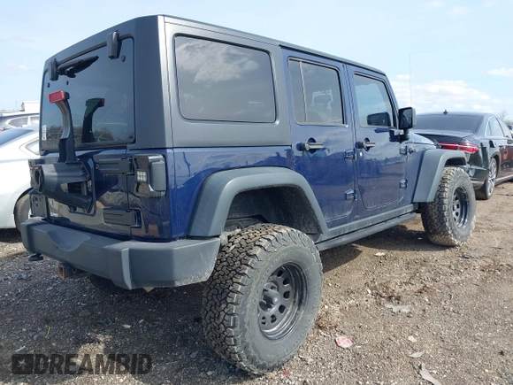 2013 Jeep Wrangler Unlimited Rubicon with VIN 1C4BJWFGXDL502435, listed as a IAAI auction lot 41937642 with 83,817 mi miles and . Bid and sale history available at DreamBid. Image 4.