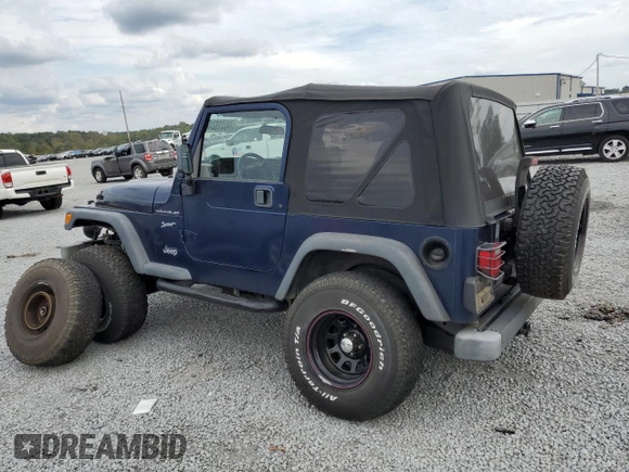 2002 Jeep Wrangler Sport with VIN 1J4FA49S62P704405, listed as a Copart auction lot 74531924 with 0 mi miles and Salvage Title. Bid and sale history available at carsss.com. Image 2.