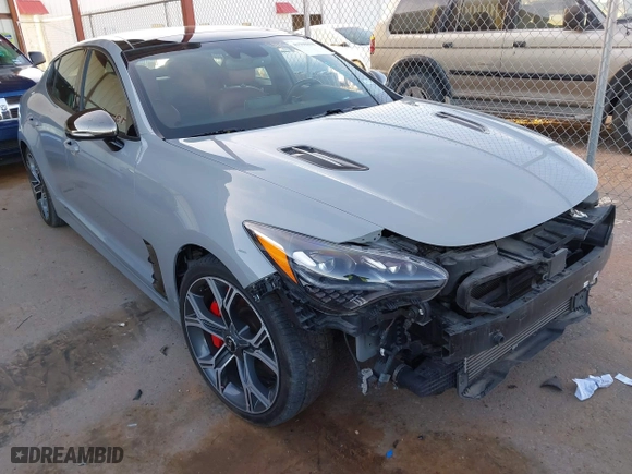 2020 Kia Stinger GT2 with VIN KNAE55LC1L6075699, listed as a IAAI auction lot 41598898 with 58,894 mi miles. Bid and sale history available at carsss.com. Image 1.