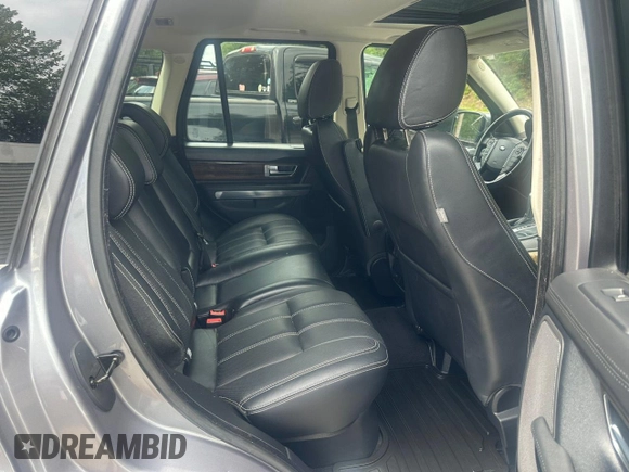2012 Land Rover Range Rover Sport HSE Lux с VIN SALSK2D44CA724227, выставлен на аукционе Copart как лот 65296265 с пробегом 120 001 миль миль и Чистый • Clean title. История ставок и продаж доступна на DreamBid. Изображение 6.