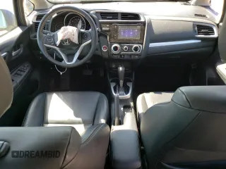 2015 Honda Fit EX-L z VIN 3HGGK5H89FM760581, wystawiony jako Copart lot #56134155 z przebiegiem 69 236 mil mil oraz Czysty tytuł • Clean title. Historia ofert i sprzedaży dostępna na DreamBid. Obrazek 8.