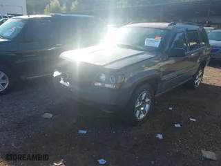2004 Jeep Grand Cherokee Laredo with VIN 1J4GX48S44C394429, listed as a IAAI auction lot 41802203 with 144,925 mi miles. Bid and sale history available at carsss.com. Image 2.