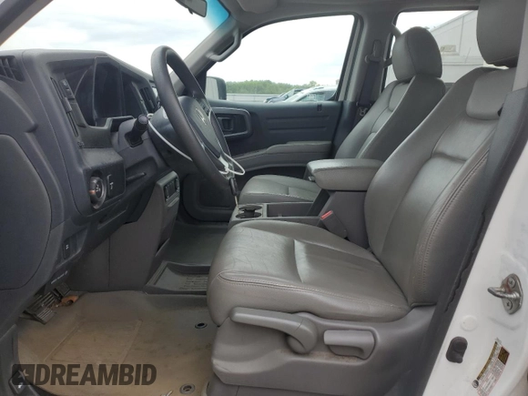 2011 Honda Ridgeline RT z VIN 5FPYK1F25BB001586, wystawiony jako Copart lot #65005405 z przebiegiem 184 046 mil mil oraz Czysty tytuł • Clean title. Historia ofert i sprzedaży dostępna na DreamBid. Obrazek 7.