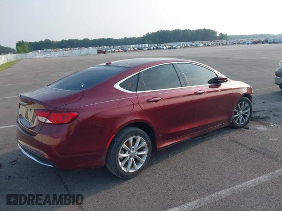 2015 Chrysler 200 C with VIN 1C3CCCCB6FN571544, listed as a IAAI auction lot 39932825 with 144,399 mi miles and . Bid and sale history available at DreamBid. Image 4.