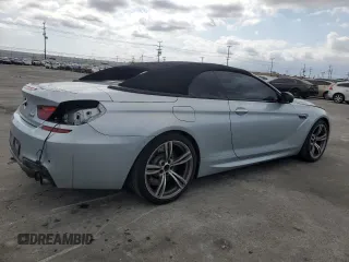 2014 BMW M6 z VIN WBSLZ9C50EDZ78344, wystawiony jako Copart lot #54719265 z przebiegiem 59 556 mil mil oraz Szkoda całkowita • Salvage title. Historia ofert i sprzedaży dostępna na DreamBid. Obrazek 3.