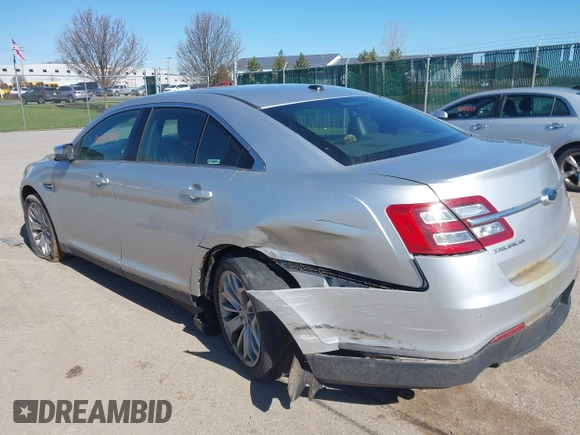 2013 Ford Taurus Limited z VIN 1FAHP2F85DG114828, wystawiony jako IAAI lot #42043885 z przebiegiem 166 786 mil mil oraz . Historia ofert i sprzedaży dostępna na DreamBid. Obrazek 3.