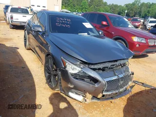 2015 Infiniti Q50 Premium z VIN JN1BV7APXFM339061, wystawiony jako IAAI lot #42273875 z przebiegiem 136 672 mil mil oraz . Historia ofert i sprzedaży dostępna na DreamBid. Obrazek 1.