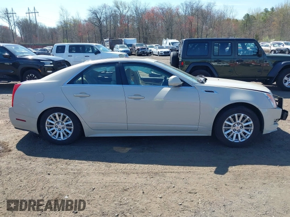 2011 Cadillac CTS Luxury with VIN 1G6DF5EY4B0114245, listed as a IAAI auction lot 42029416 with 83,473 mi miles and . Bid and sale history available at DreamBid. Image 13.