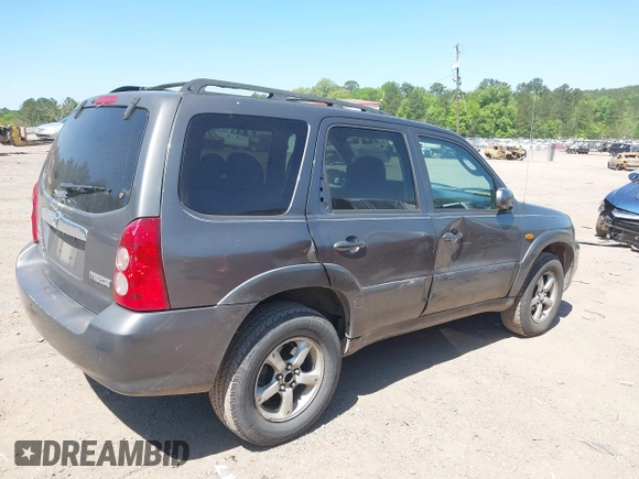 2005 Mazda Tribute S with VIN 4F2YZ04125KM04568, listed as a IAAI auction lot 41973671 with 244,117 mi miles and . Bid and sale history available at carsss.com. Image 6.