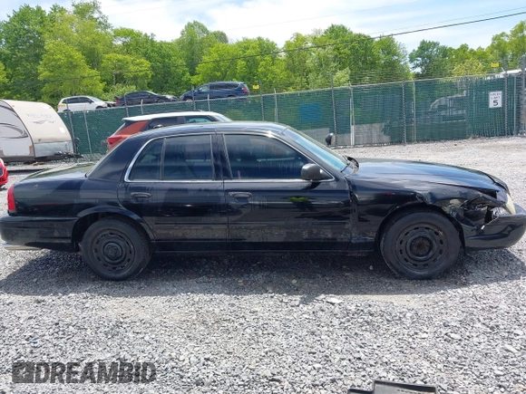 2005 Ford Police Interceptor z VIN 2FAHP71WX5X158807, wystawiony jako IAAI lot #42282107 z przebiegiem 153 787 mil mil oraz . Historia ofert i sprzedaży dostępna na DreamBid. Obrazek 13.