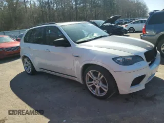 2012 BMW X5 M with VIN 5YMGY0C51CLK27397, listed as a Copart auction lot 48947555 with 0 mi miles and Salvage Title. Bid and sale history available at carsss.com. Image 4.