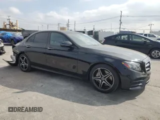 2019 Mercedes-Benz E 300 with VIN WDDZF4JB9KA517202, listed as a Copart auction lot 54513665 with 88,919 mi miles and Salvage title. Bid and sale history available at DreamBid. Image 4.