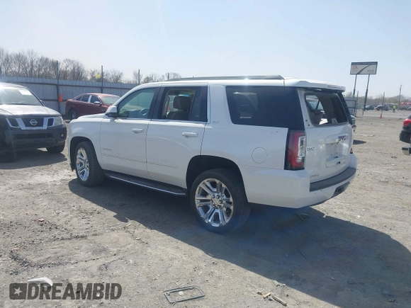 2017 GMC Yukon SLT with VIN 1GKS1BKC9HR278190, listed as a IAAI auction lot 41824213 with 104,323 mi miles. Bid and sale history available at carsss.com. Image 3.
