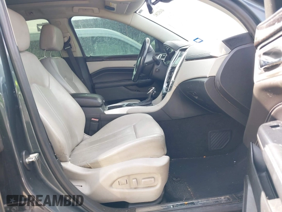 2013 Cadillac SRX Performance Collection with VIN 3GYFNDE38DS598028, listed as a IAAI auction lot 41452362 with 201,261 mi miles and . Bid and sale history available at DreamBid. Image 5.