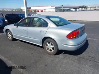 2000 Oldsmobile Alero GL2 z VIN 1G3NL52T6YC434404, wystawiony jako IAAI lot #42488982 z przebiegiem 110 828 mil mil oraz . Historia ofert i sprzedaży dostępna na DreamBid. Obrazek 3.