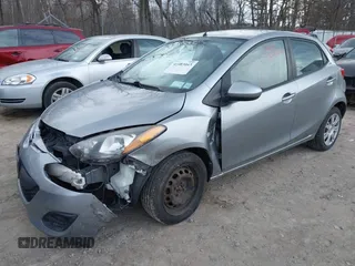 2013 Mazda Mazda2 Sport with VIN JM1DE1KY5D0159551, listed as a IAAI auction lot 41903043 with 107,858 mi miles. Bid and sale history available at carsss.com. Image 2.