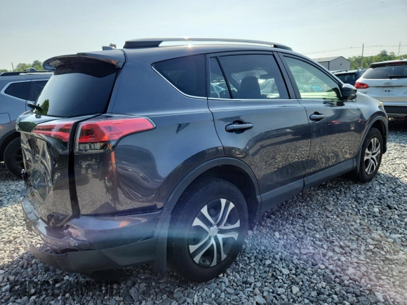 2017 Toyota RAV4 LE with VIN JTMBFREV5HJ146464, listed as a Copart auction lot 61841125 with 125,365 mi miles and Salvage title. Bid and sale history available at DreamBid. Image 3.