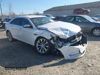 2013 Ford Taurus Limited with VIN 1FAHP2F84DG166824, listed as a IAAI auction lot 41887725 with 119,864 mi miles. Bid and sale history available at carsss.com. Image 1.