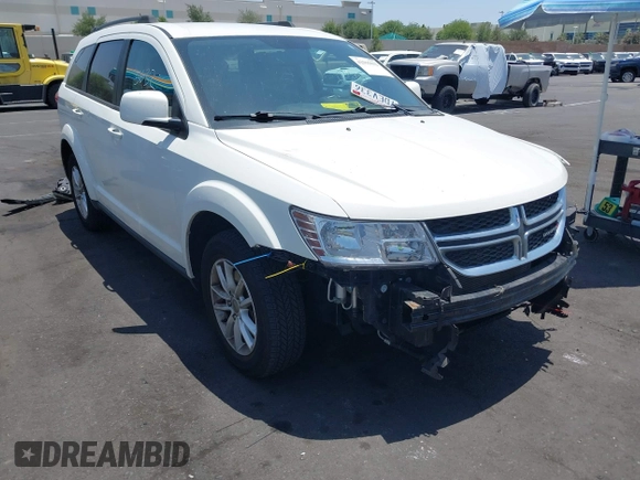 2013 Dodge Journey SXT with VIN 3C4PDCBG4DT696966, listed as a IAAI auction lot 42555632 with 144,927 mi miles and . Bid and sale history available at DreamBid. Image 1.