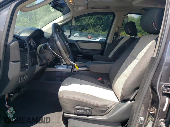 2011 Nissan Titan SL with VIN 1N6BA0ECXBN322611, listed as a Copart auction lot 63002925 with 159,785 mi miles and Salvage title. Bid and sale history available at DreamBid. Image 7.