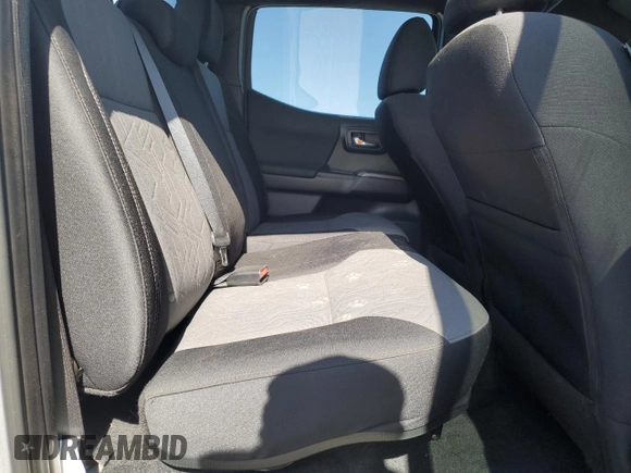 2023 Toyota Tacoma SR with VIN 3TMCZ5AN3PM645372, listed as a Copart auction lot 59917365 with 27,146 mi miles and Salvage title. Bid and sale history available at DreamBid. Image 10.