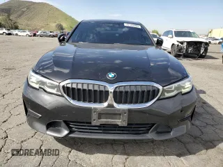 2020 BMW 3 Series 330i with VIN WBA5R1C02LFH42057, listed as a Copart auction lot 47142865 with 200,121 mi miles and Clean Title. Bid and sale history available at carsss.com. Image 5.