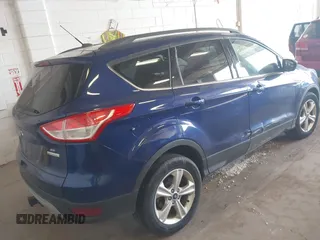 2014 Ford Escape SE with VIN 1FMCU0GX2EUB60350, listed as a IAAI auction lot 42159803 with 109,601 mi miles. Bid and sale history available at carsss.com. Image 4.