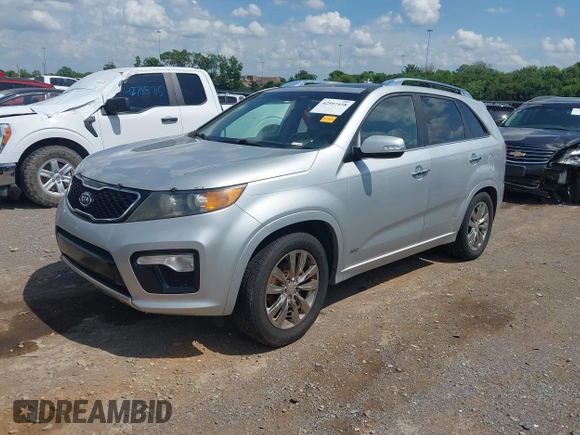 2011 Kia Sorento SX with VIN 5XYKWDA21BG144877, listed as a IAAI auction lot 42597458 with 238,443 mi miles and . Bid and sale history available at DreamBid. Image 2.