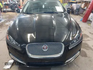 2015 Jaguar XF V6 Portfolio with VIN SAJWJ0FF5F8U57756, listed as a IAAI auction lot 41631278 with 47,158 mi miles. Bid and sale history available at carsss.com. Image 6.