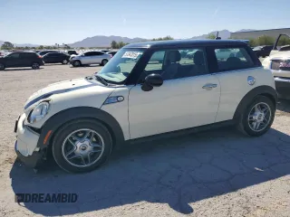 2009 MINI Hardtop S with VIN WMWMF73559TW83208, listed as a Copart auction lot 57347015 with 76,898 mi miles and Salvage title. Bid and sale history available at DreamBid. Image 1.