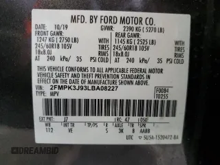 2020 Ford Edge SEL z VIN 2FMPK3J93LBA08227, wystawiony jako Copart lot #57804365 z przebiegiem 57 366 mil mil oraz Szkoda całkowita • Salvage title. Historia ofert i sprzedaży dostępna na DreamBid. Obrazek 13.