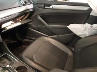 2015 Volkswagen Passat 1.8T S with VIN 1VWAT7A34FC096247, listed as a IAAI auction lot 41522933 with 143,250 mi miles. Bid and sale history available at carsss.com. Image 5.